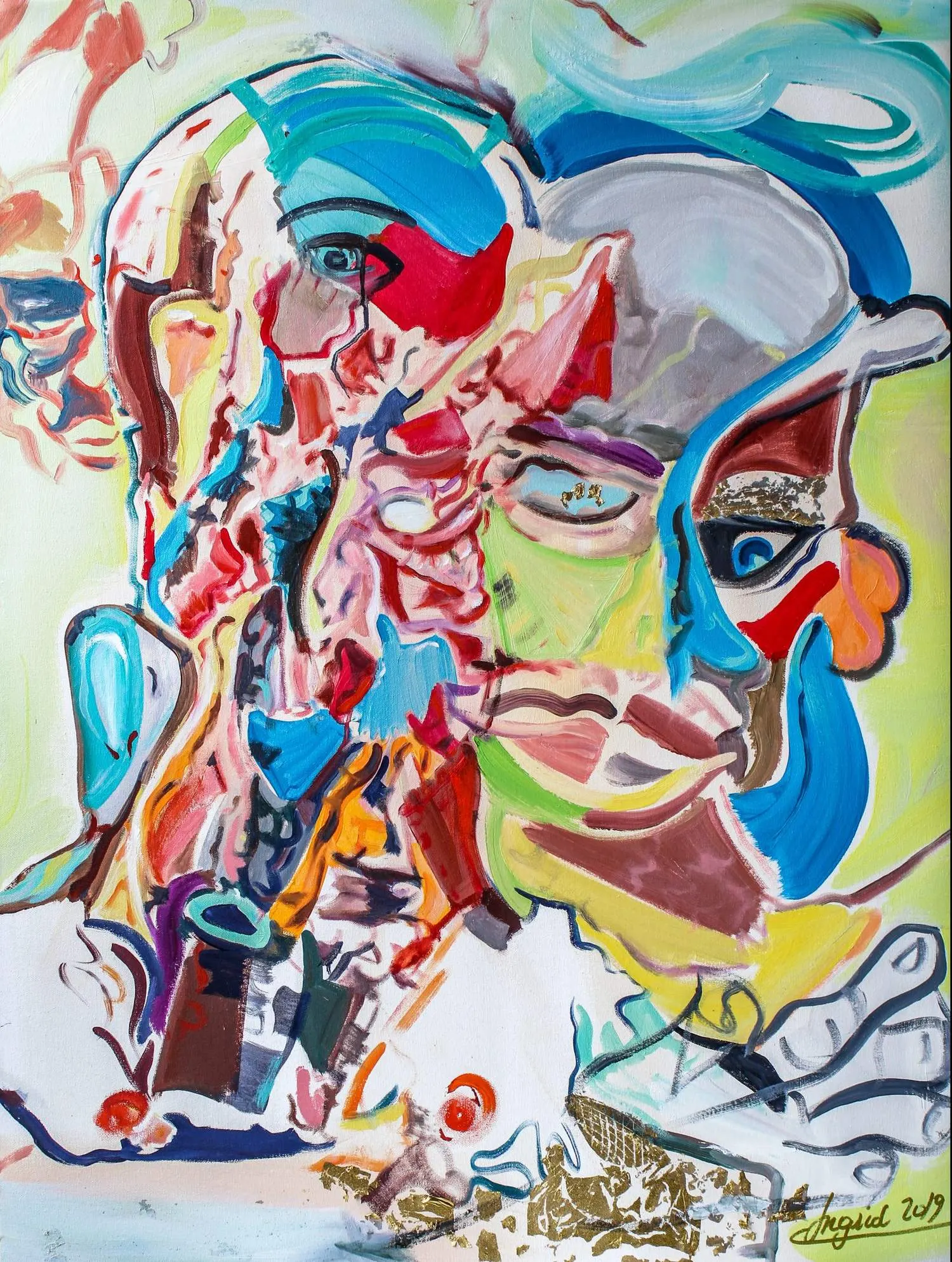 Abstract painting of a fragmented human face divided into warm red and pink tones on one side and cool green and blue tones on the other, with teal hair and small gold leaf accents near the mouth.